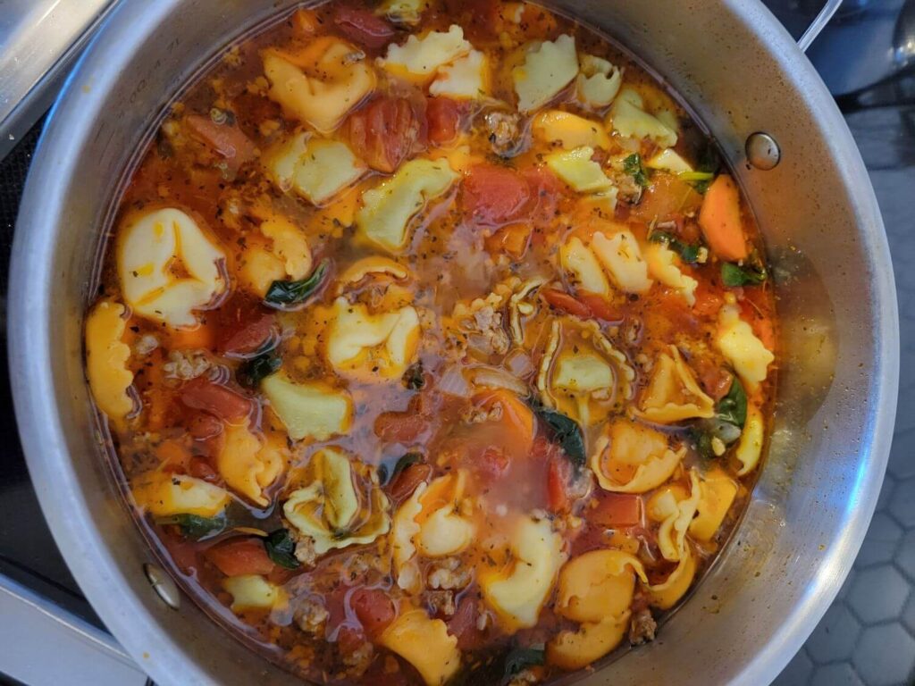 A pot of tortellini soup